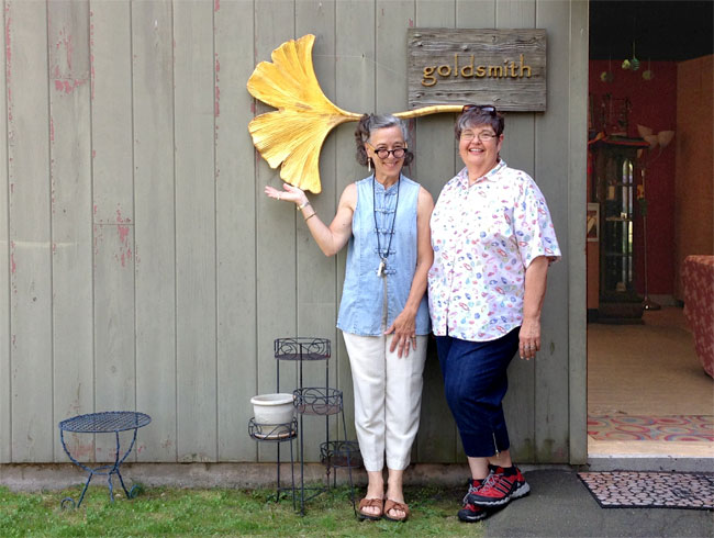 Raimie Weber and Deb Vandenbroucke enjoying a visit at her shop