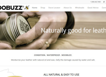 screenshot of Moobuzz home page - large image with transparent overlay